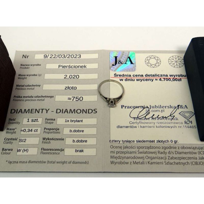 Pierścionek cert (wycena 4700) p 750 waga (g): 2,02